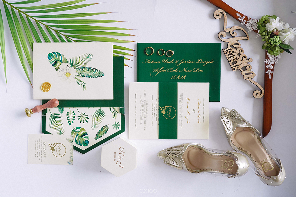 Metwin and Jessica's emerald green invitation cards